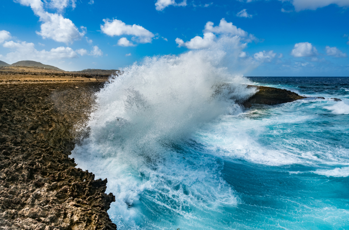 wave breaking on beach